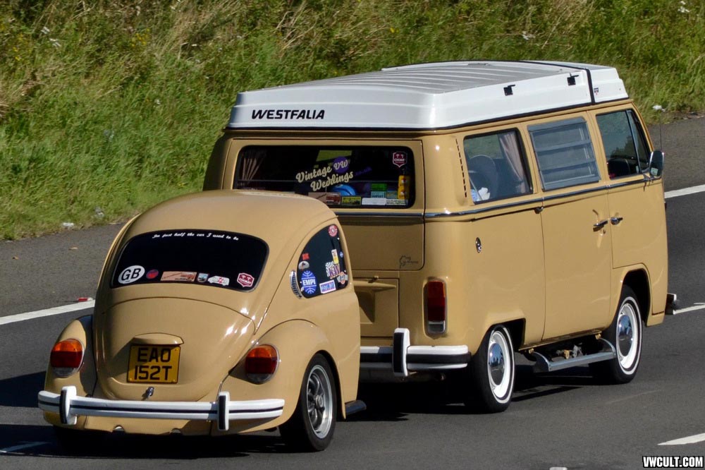 vw bus with half-beetle trailer